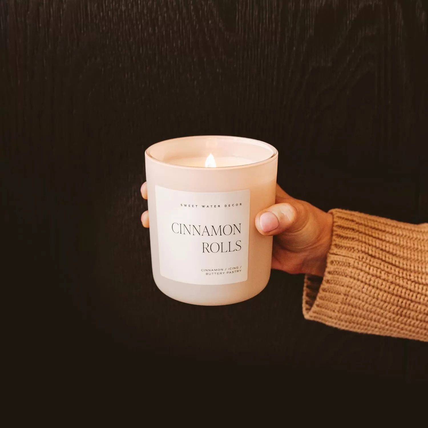 imageSweet Water Decor By The Fireside Candle  Vanilla Caramel Amber Tonka Smoky Woods Musk Winter Scented Soy Candles for Home  15oz Tan Jar 70 Hour Burn Time Made in the USATan
