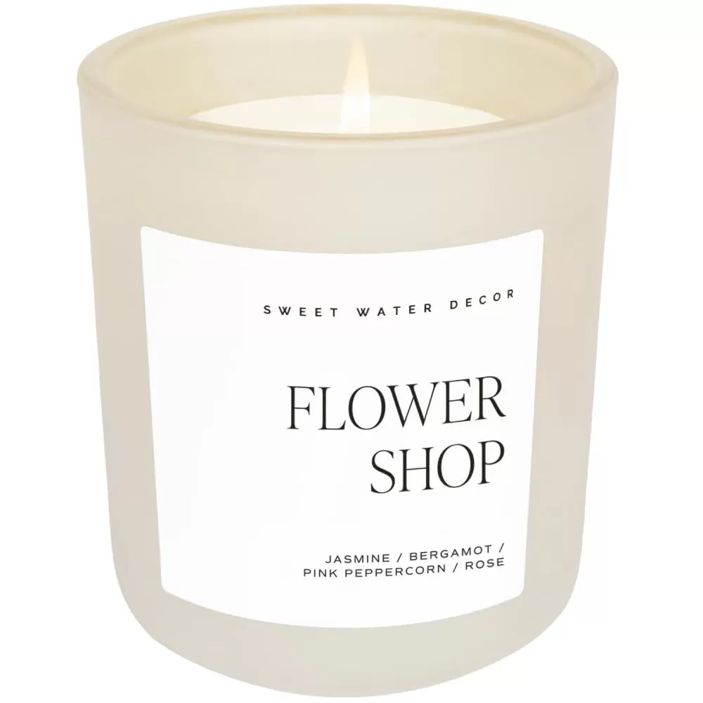 imageSweet Water Decor By The Fireside Candle  Vanilla Caramel Amber Tonka Smoky Woods Musk Winter Scented Soy Candles for Home  15oz Tan Jar 70 Hour Burn Time Made in the USATan