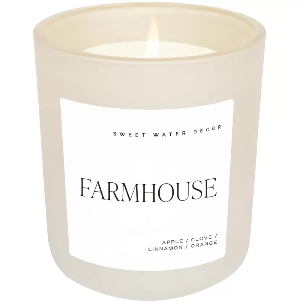 imageSweet Water Decor By The Fireside Candle  Vanilla Caramel Amber Tonka Smoky Woods Musk Winter Scented Soy Candles for Home  15oz Tan Jar 70 Hour Burn Time Made in the USATan