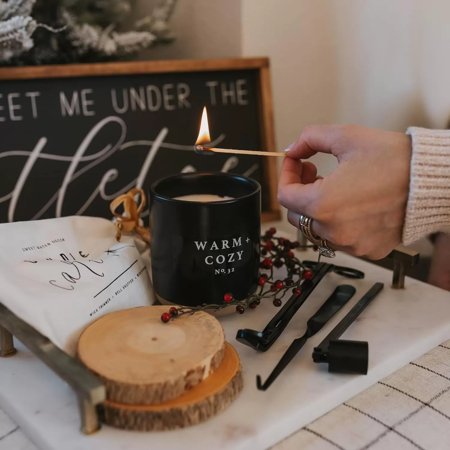 imageSweet Water Decor Christmas Candle  Apple Cider Cinnamon Fresh Cut Christmas Tree and Cookies Scented Soy Candle for Home  12oz Black Stoneware Jar 60 Hour Burn Time Made in the USAWarm  Cozy