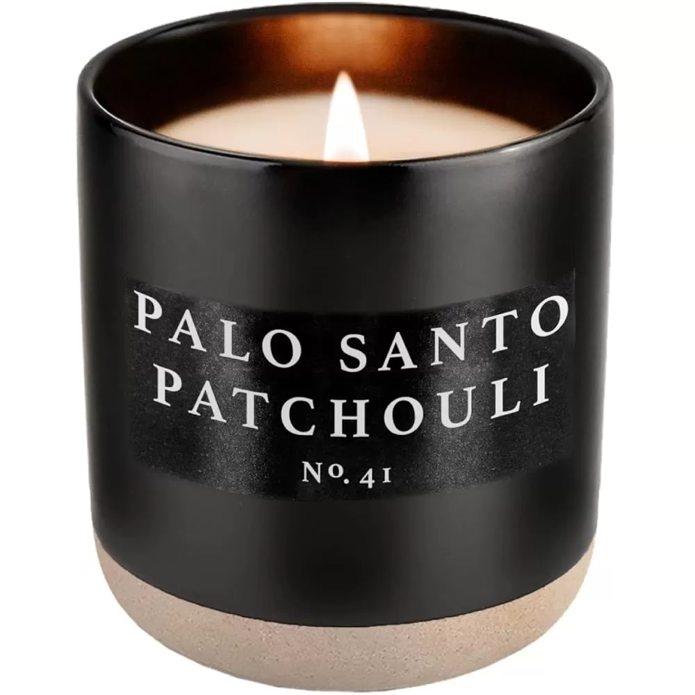 imageSweet Water Decor Christmas Candle  Apple Cider Cinnamon Fresh Cut Christmas Tree and Cookies Scented Soy Candle for Home  12oz Black Stoneware Jar 60 Hour Burn Time Made in the USAPalo Santo Patchouli