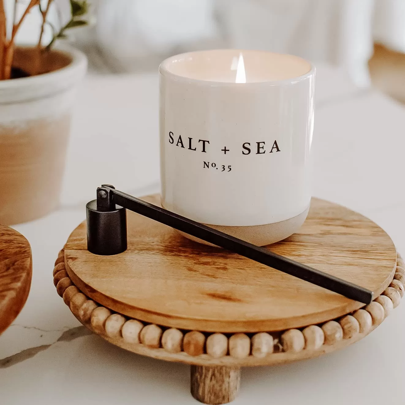 imageSweet Water Decor Christmas Candle  Apple Cider Cinnamon Fresh Cut Christmas Tree and Cookies Scented Soy Candle for Home  12oz Black Stoneware Jar 60 Hour Burn Time Made in the USASalt  Sea