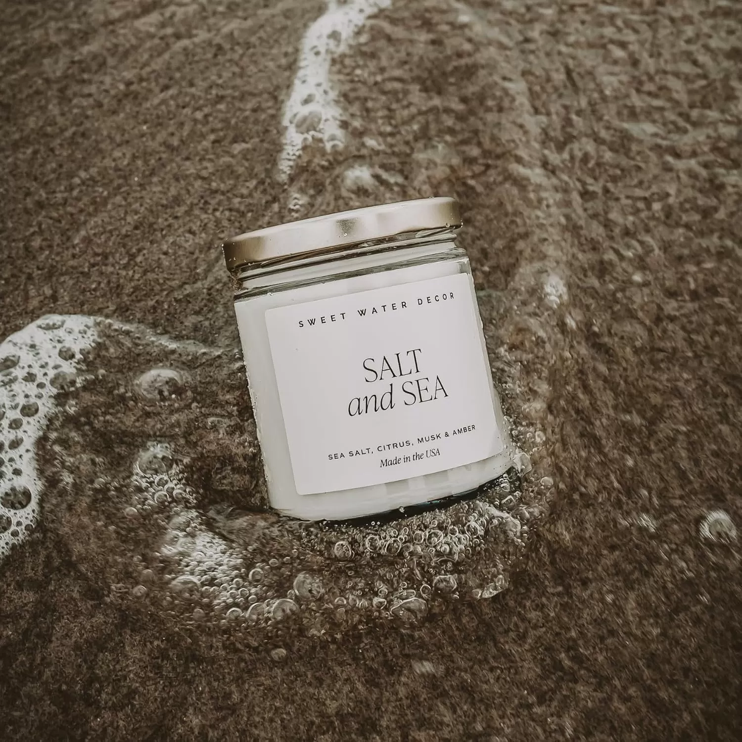 imageSweet Water Decor Christmas Candle  Cinnamon Trees Orange and Clove Scents  Christmas Candles and Decor for Home  9oz Clear Jar Soy Candle Made in the USASalt and Sea