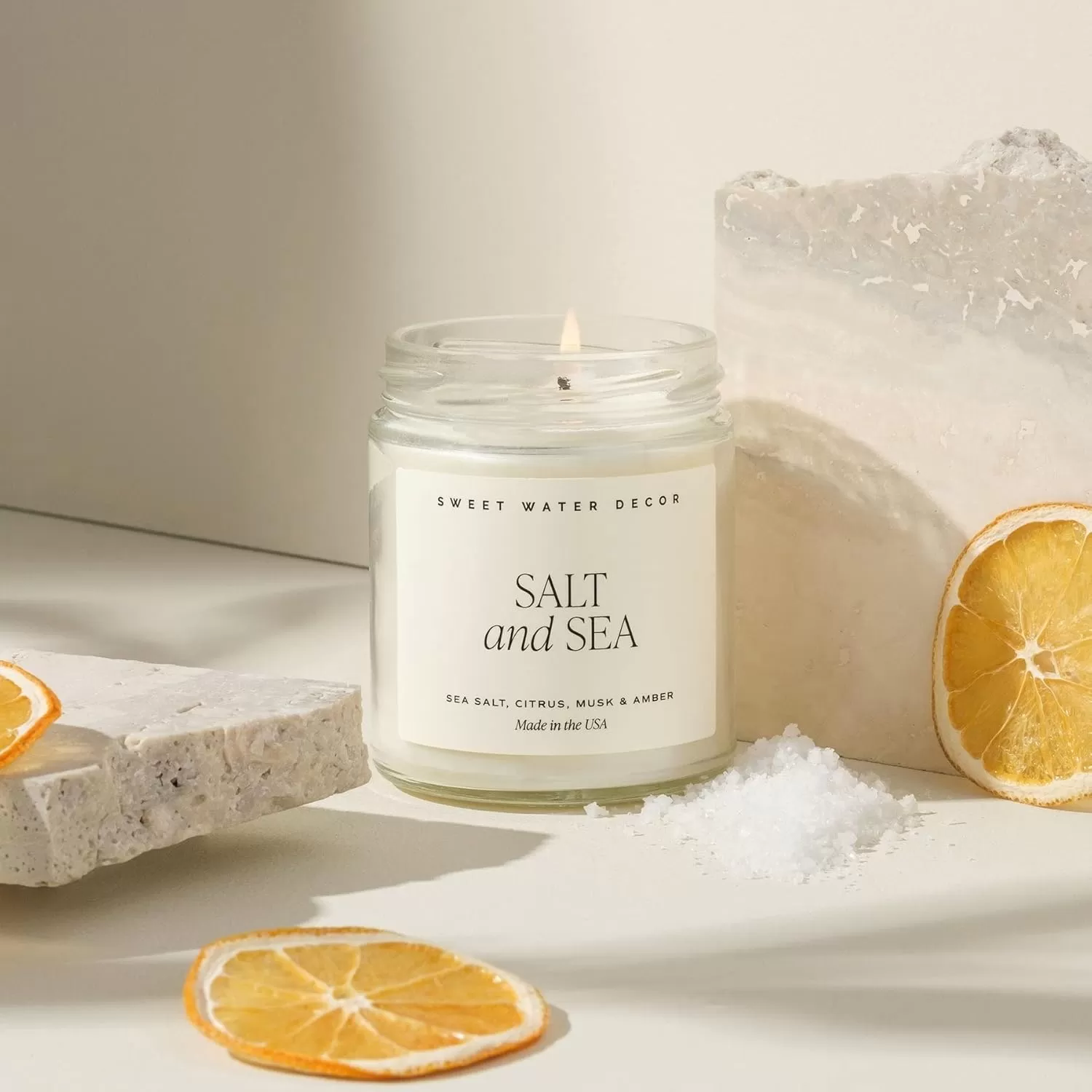 imageSweet Water Decor Christmas Candle  Cinnamon Trees Orange and Clove Scents  Christmas Candles and Decor for Home  9oz Clear Jar Soy Candle Made in the USASalt and Sea