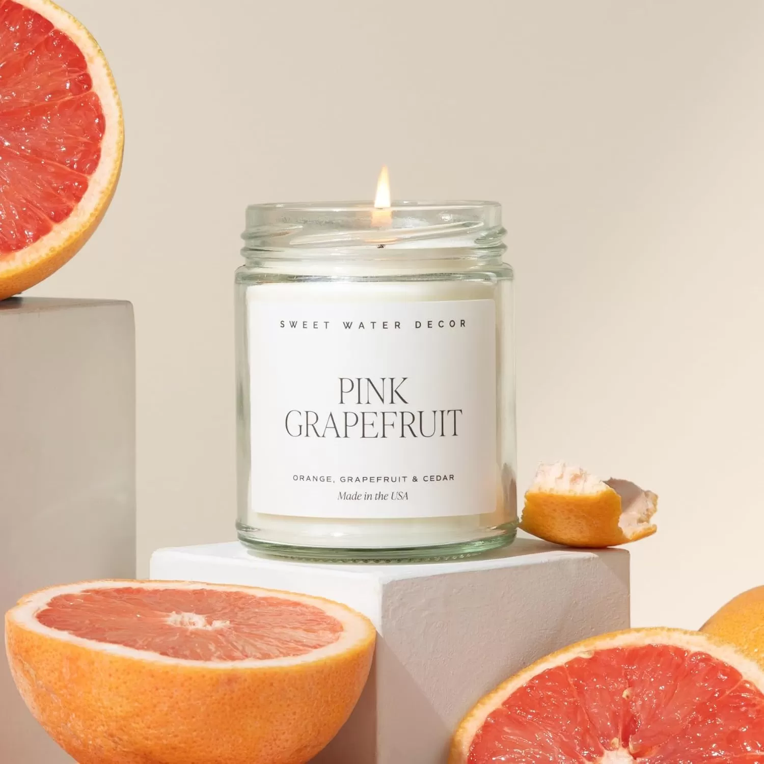 imageSweet Water Decor Christmas Candle  Cinnamon Trees Orange and Clove Scents  Christmas Candles and Decor for Home  9oz Clear Jar Soy Candle Made in the USAPink Grapefruit