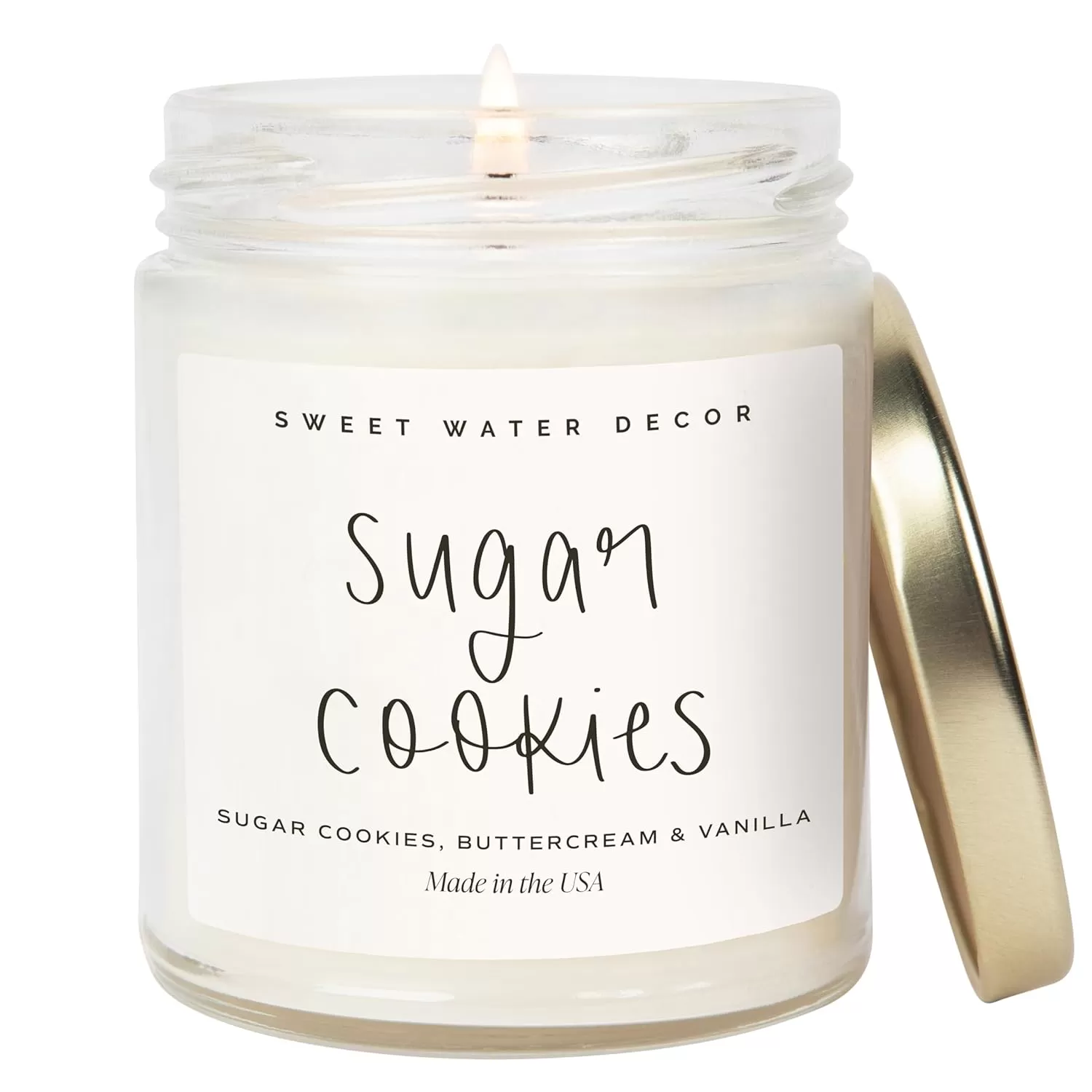 imageSweet Water Decor Christmas Candle  Cinnamon Trees Orange and Clove Scents  Christmas Candles and Decor for Home  9oz Clear Jar Soy Candle Made in the USASugar Cookies
