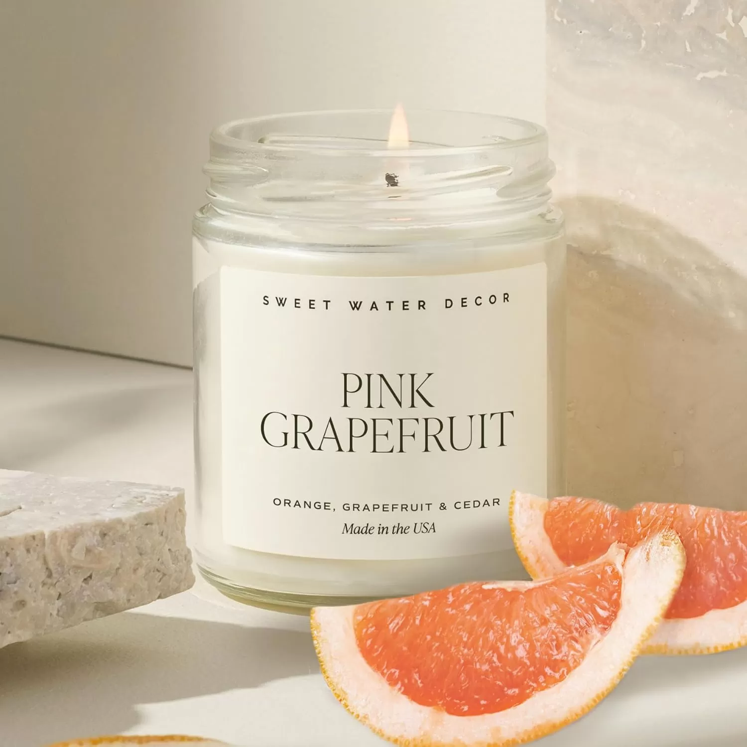 imageSweet Water Decor Christmas Candle  Cinnamon Trees Orange and Clove Scents  Christmas Candles and Decor for Home  9oz Clear Jar Soy Candle Made in the USAPink Grapefruit