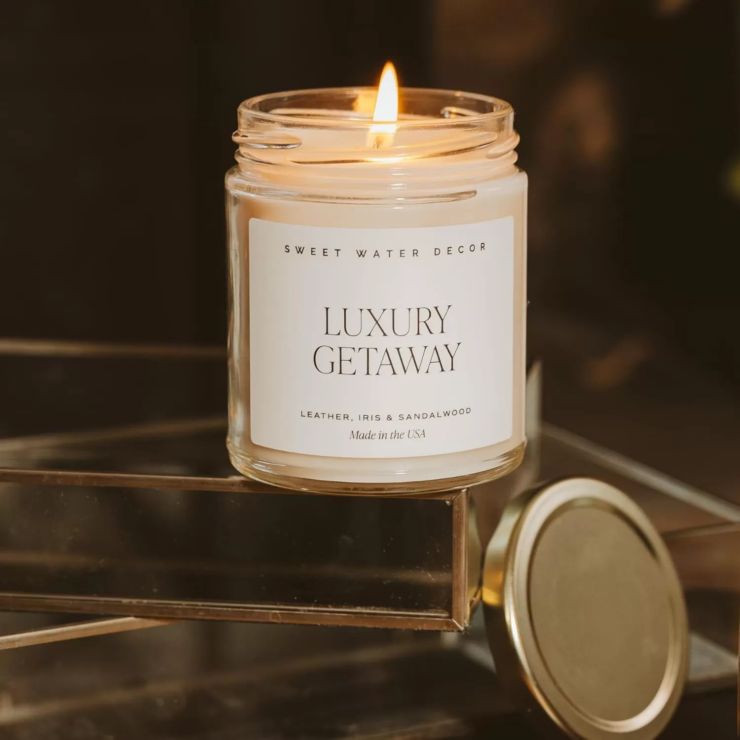imageSweet Water Decor Christmas Tree Candle  Pine Needles Cedarwood Cypress and Evergreen Soy Holiday Scented Candles for Home  9oz Clear Jar Candle 40 Hour Burn Time Made in the USALuxury Getaway