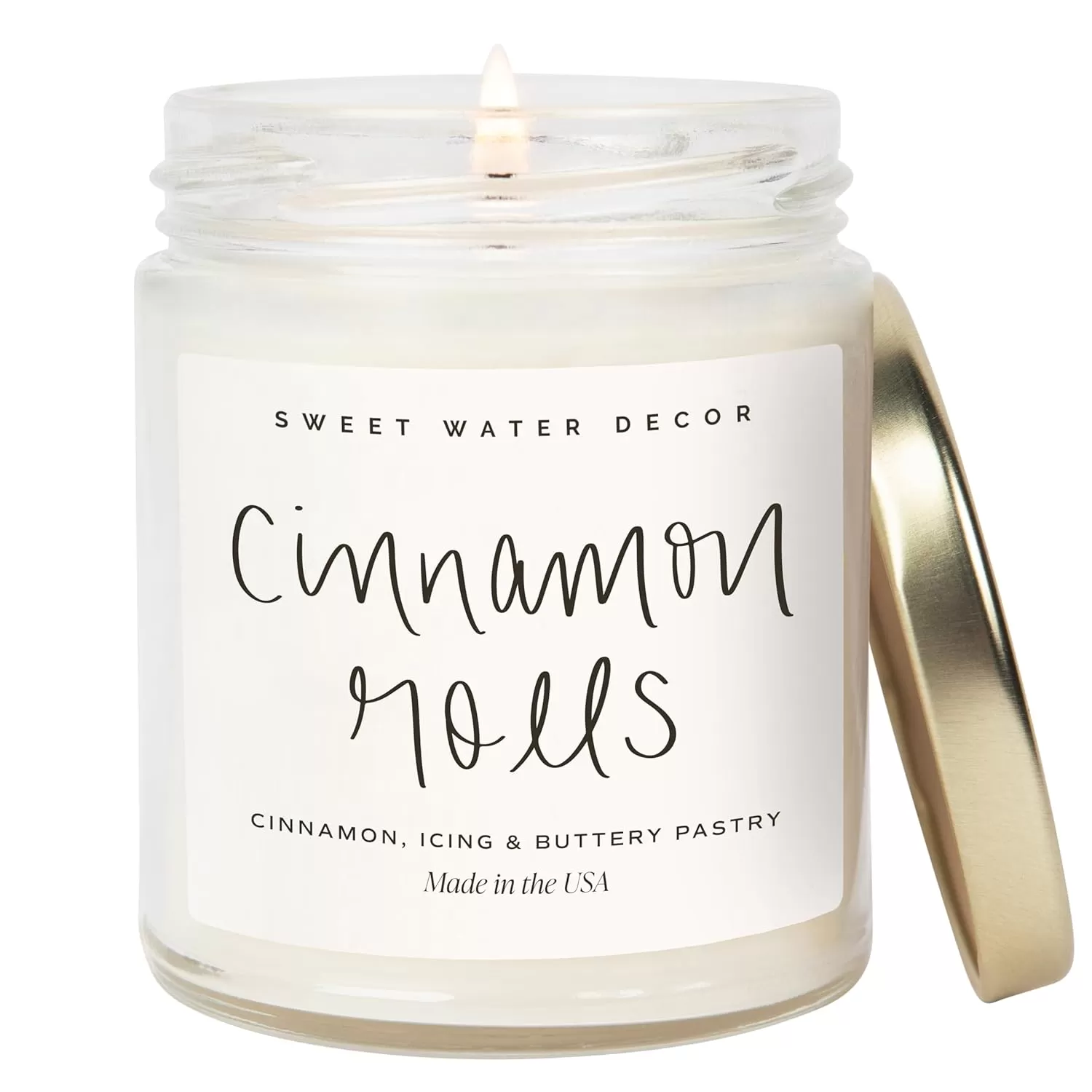imageSweet Water Decor Christmas Tree Candle  Pine Needles Cedarwood Cypress and Evergreen Soy Holiday Scented Candles for Home  9oz Clear Jar Candle 40 Hour Burn Time Made in the USACinnamon Rolls