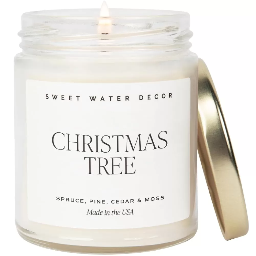 imageSweet Water Decor Christmas Tree Candle  Pine Needles Cedarwood Cypress and Evergreen Soy Holiday Scented Candles for Home  9oz Clear Jar Candle 40 Hour Burn Time Made in the USAChristmas Tree
