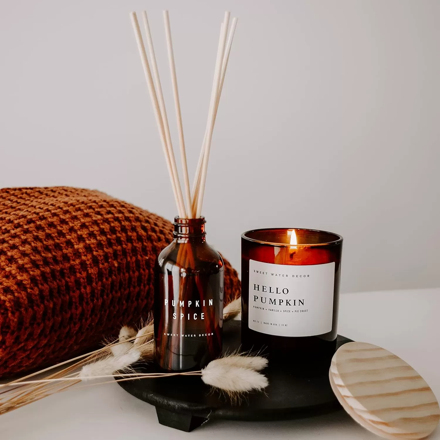 imageSweet Water Decor Farmhouse Candle  Autumn Cinnamon and Nutmeg Fall Scented Soy Candles for Home  11oz White Glass  Wood Lid 50 Hour Burn Time Made in the USAAmber