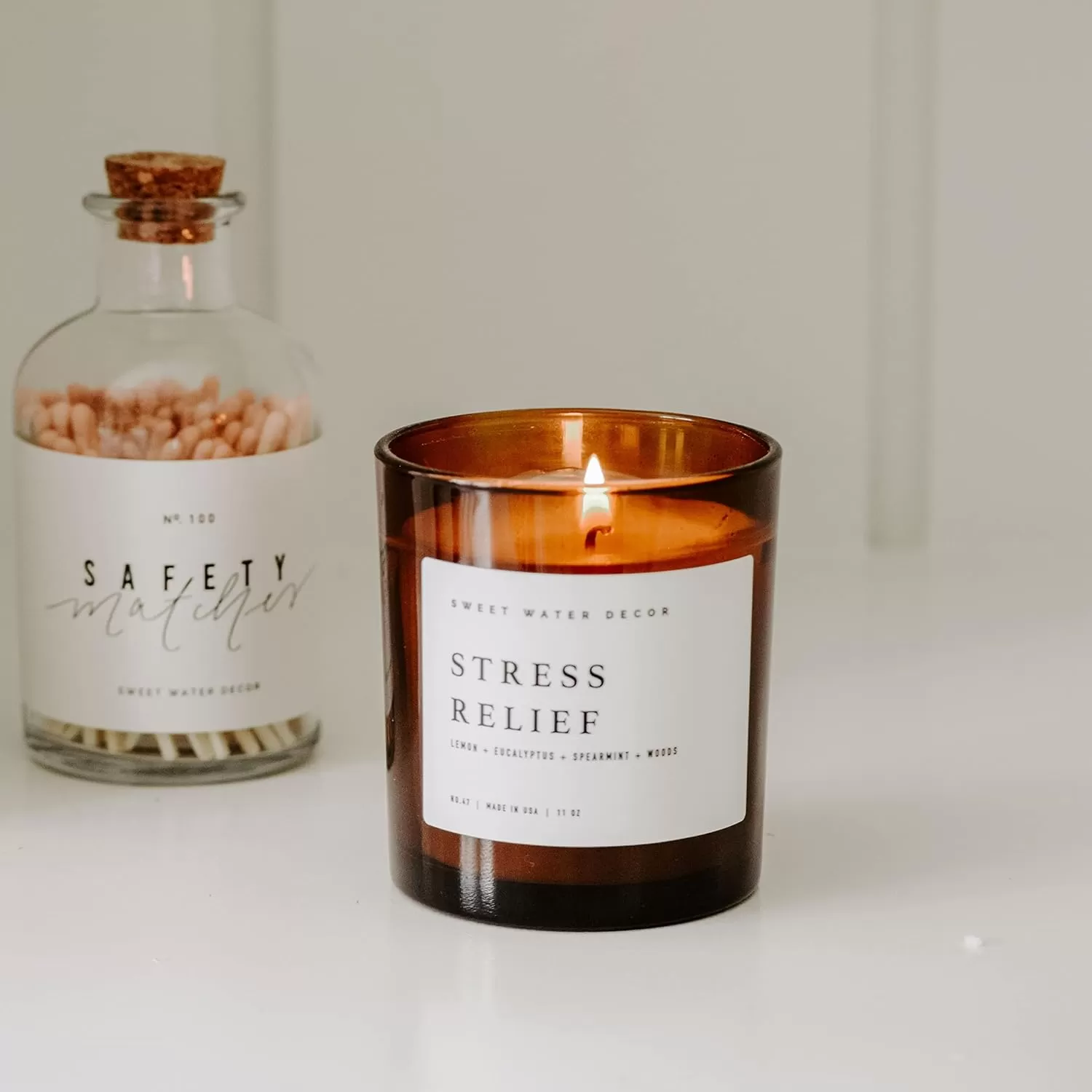 imageSweet Water Decor Farmhouse Candle  Autumn Cinnamon and Nutmeg Fall Scented Soy Candles for Home  11oz White Glass  Wood Lid 50 Hour Burn Time Made in the USAAmber