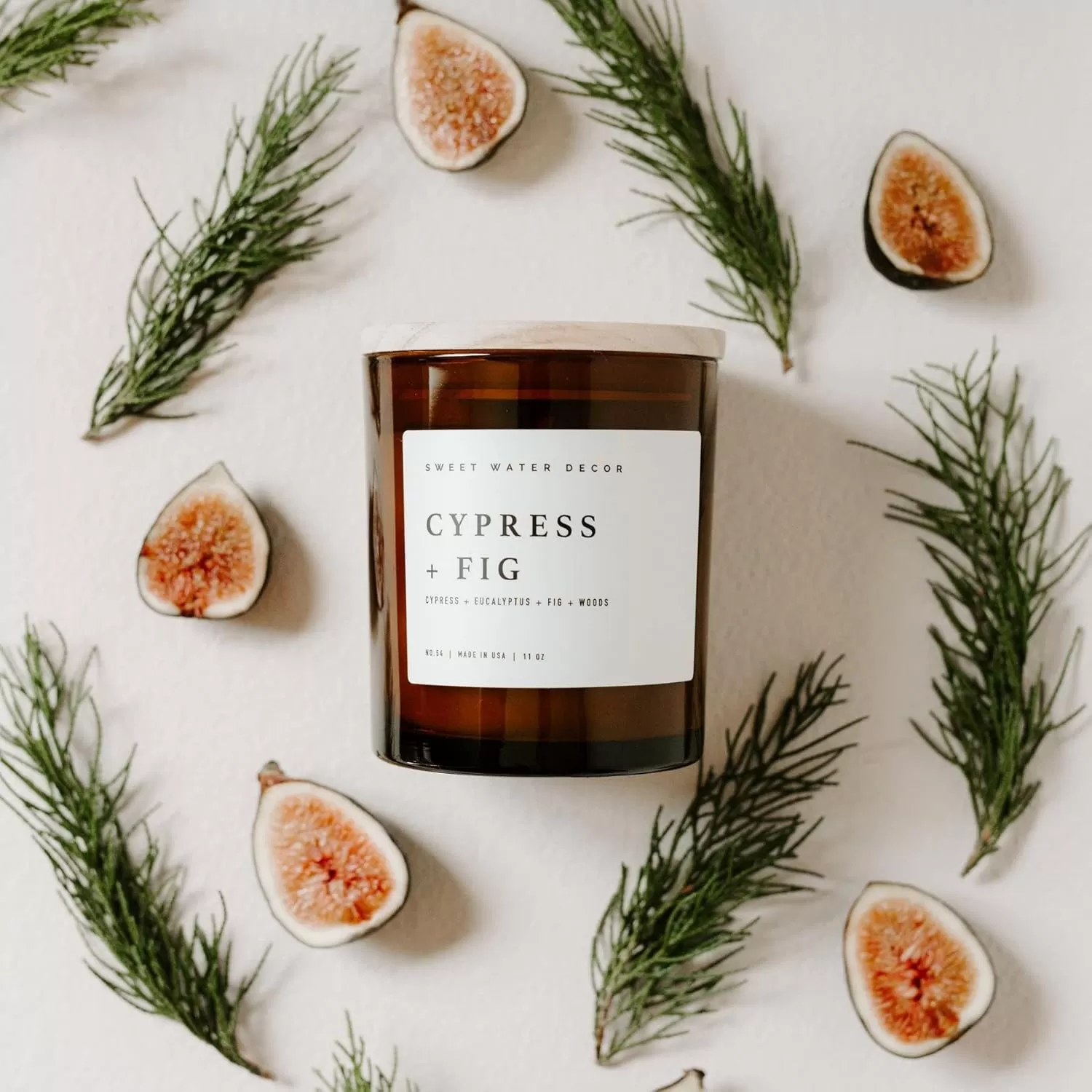 imageSweet Water Decor Farmhouse Candle  Autumn Cinnamon and Nutmeg Fall Scented Soy Candles for Home  11oz White Glass  Wood Lid 50 Hour Burn Time Made in the USAAmber
