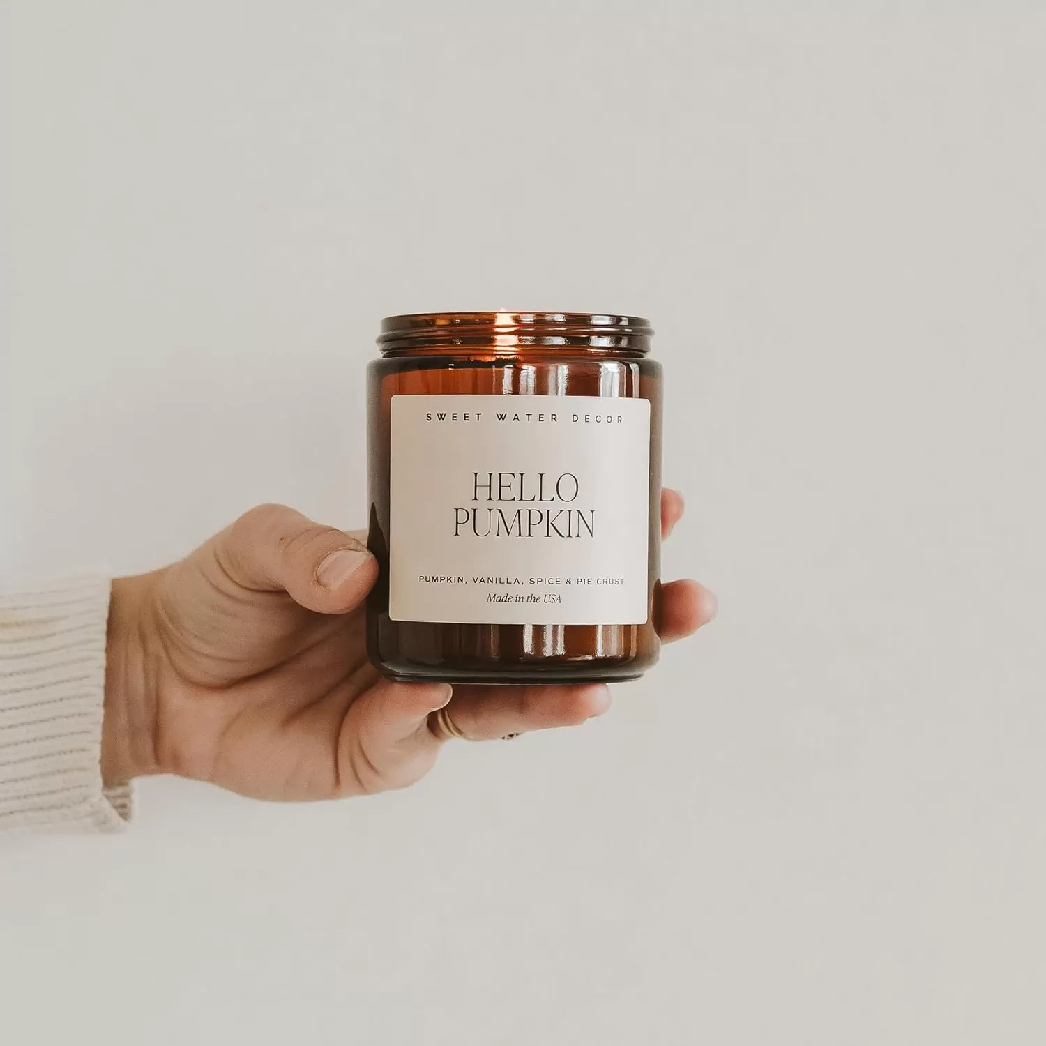 imageSweet Water Decor Island Air Soy Candle  Tropical Fruit Mountain Air and Orange Scented Summer Candles for Home  9oz Amber Jar  Black Lid 40 Hour Burn Time Made in the USAHello Pumpkin