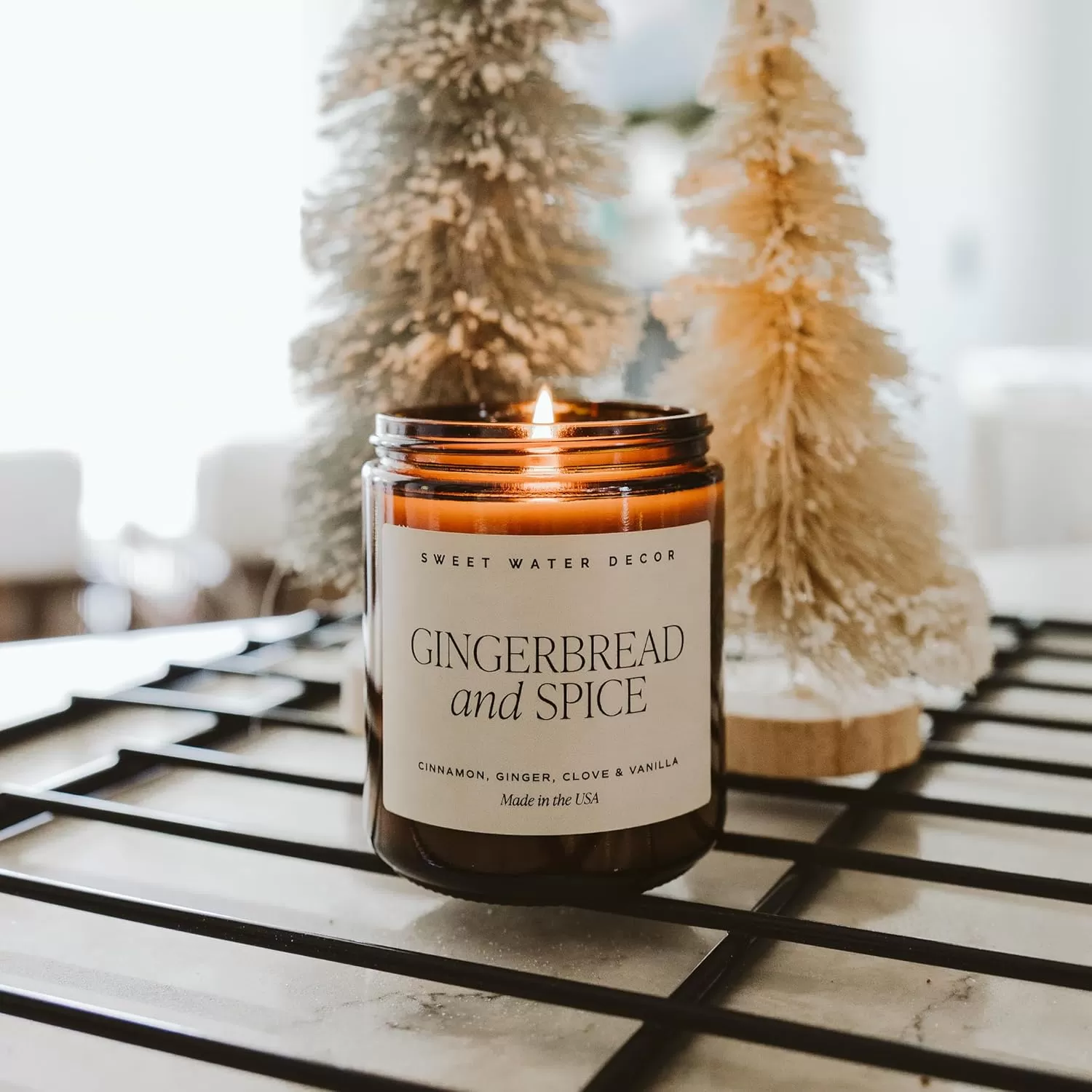 imageSweet Water Decor Island Air Soy Candle  Tropical Fruit Mountain Air and Orange Scented Summer Candles for Home  9oz Amber Jar  Black Lid 40 Hour Burn Time Made in the USAGingerbread  Spice