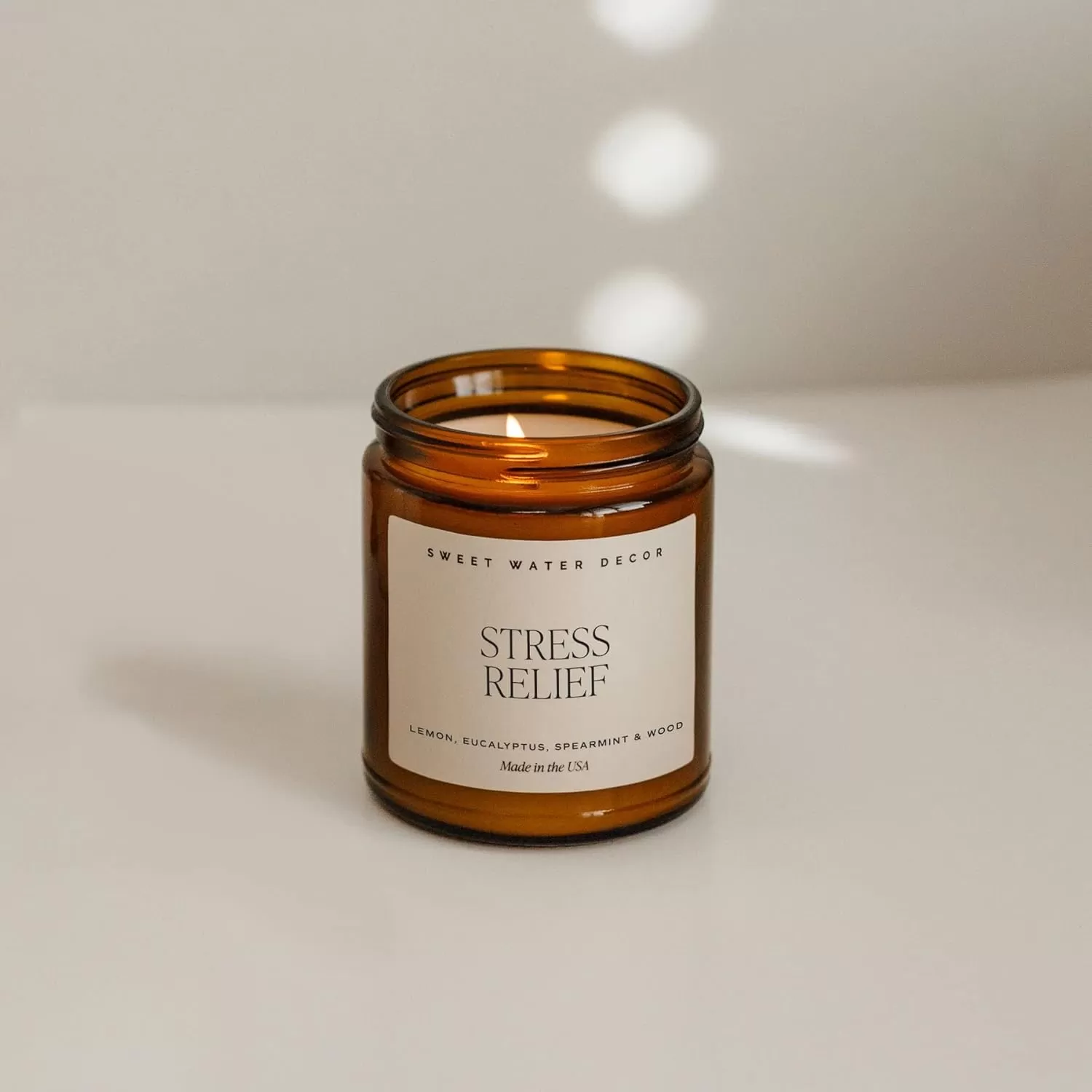 imageSweet Water Decor Island Air Soy Candle  Tropical Fruit Mountain Air and Orange Scented Summer Candles for Home  9oz Amber Jar  Black Lid 40 Hour Burn Time Made in the USAStress Relief