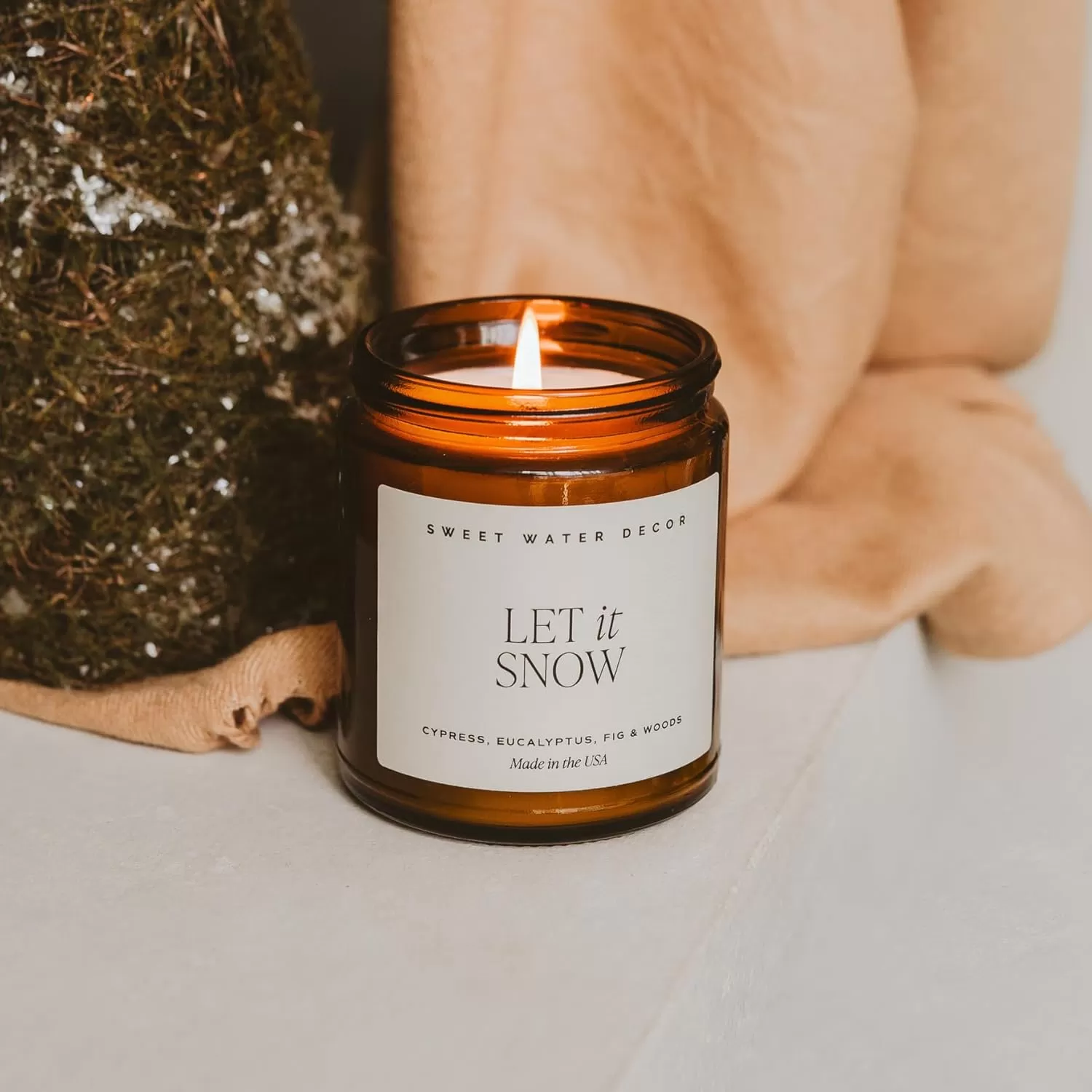 imageSweet Water Decor Palo Santo Patchouli Candle  Vanilla Musk Sandalwood Patchouli Scented Soy Candles for Home  Gifts for Women Men Housewarming  9oz Amber Jar 40 Hour Burn TimeLet It Snow