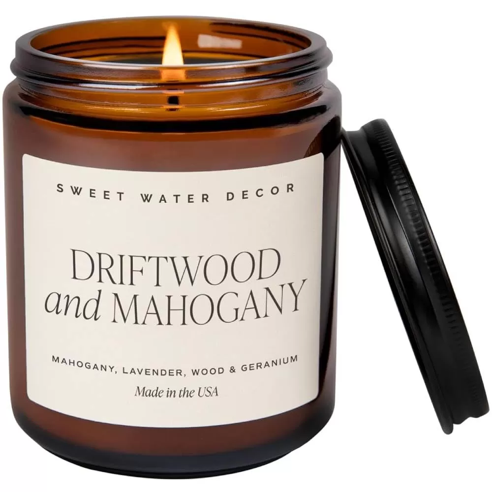 imageSweet Water Decor Palo Santo Patchouli Candle  Vanilla Musk Sandalwood Patchouli Scented Soy Candles for Home  Gifts for Women Men Housewarming  9oz Amber Jar 40 Hour Burn TimeDriftwood and Mahogany