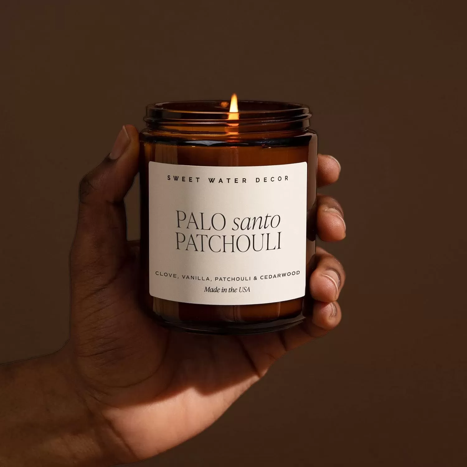 imageSweet Water Decor Palo Santo Patchouli Candle  Vanilla Musk Sandalwood Patchouli Scented Soy Candles for Home  Gifts for Women Men Housewarming  9oz Amber Jar 40 Hour Burn TimePalo Santo Patchouli