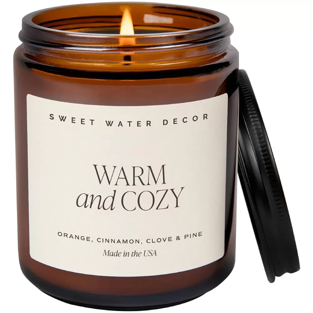imageSweet Water Decor Palo Santo Patchouli Candle  Vanilla Musk Sandalwood Patchouli Scented Soy Candles for Home  Gifts for Women Men Housewarming  9oz Amber Jar 40 Hour Burn TimeWarm  Cozy