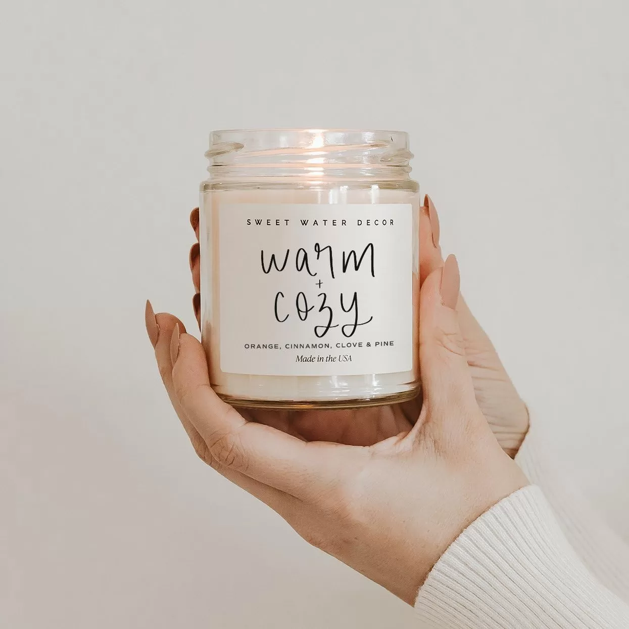 imageSweet Water Decor Relaxation Soy Candle  Eucalyptus Peppermint and Clove Scented Candles for Home  9oz Clear Jar  Gold Lid 40 Hour Burn Time Made in the USAWarm and Cozy