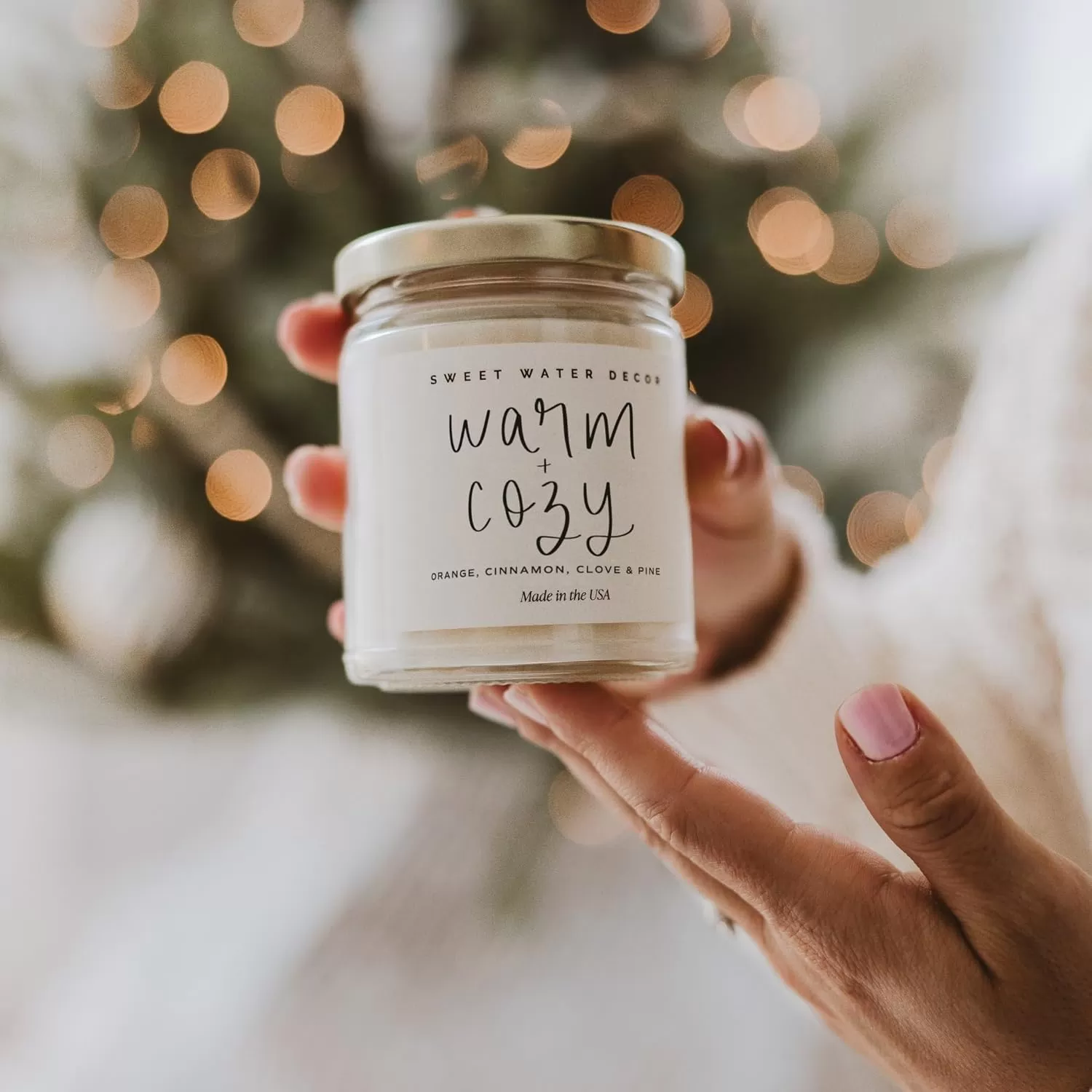 imageSweet Water Decor Relaxation Soy Candle  Eucalyptus Peppermint and Clove Scented Candles for Home  9oz Clear Jar  Gold Lid 40 Hour Burn Time Made in the USAWarm and Cozy