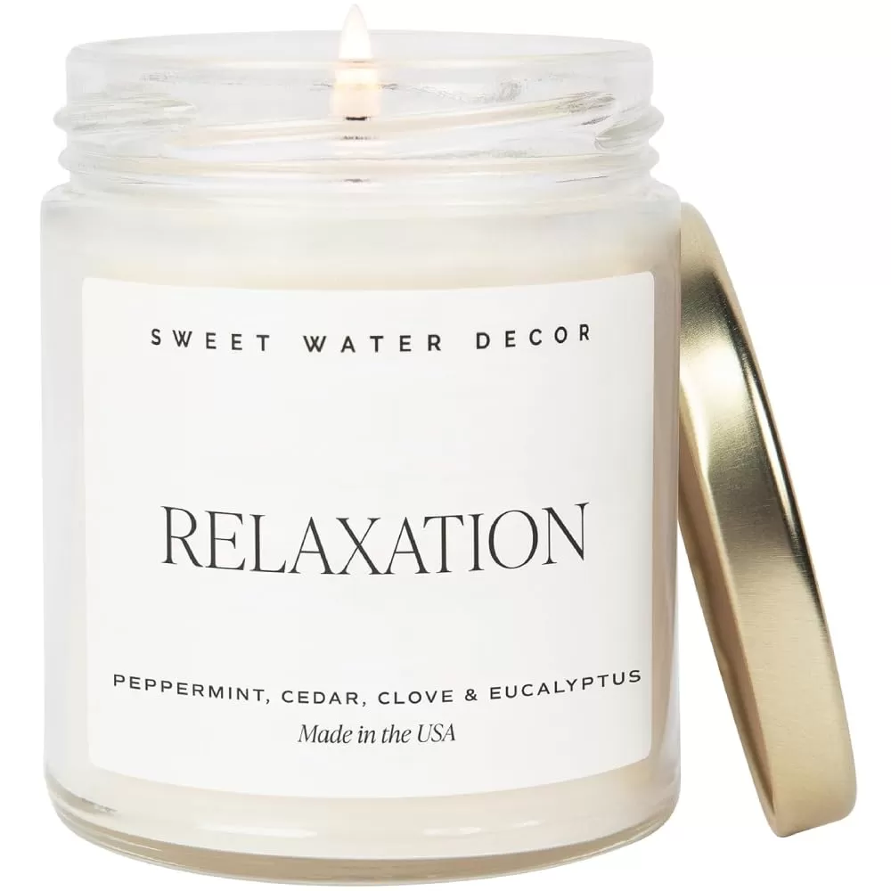imageSweet Water Decor Relaxation Soy Candle  Eucalyptus Peppermint and Clove Scented Candles for Home  9oz Clear Jar  Gold Lid 40 Hour Burn Time Made in the USARelaxation
