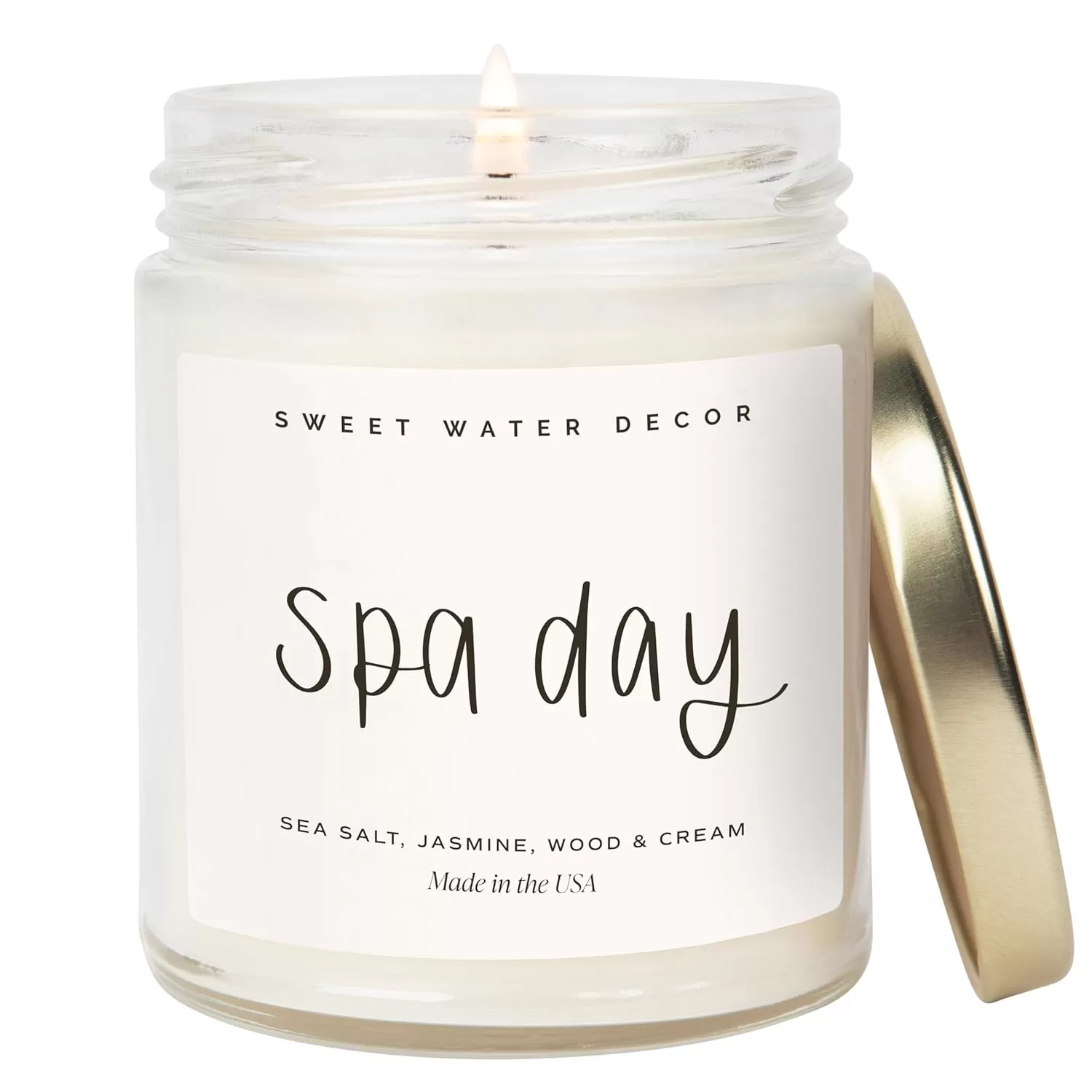imageSweet Water Decor Spa Day Soy Candle  Sea Salt Jasmine Wood and Cream Scented Candles for Home  9oz Clear Jar  Gold Lid 40 Hour Burn Time Made in the USASpa Day