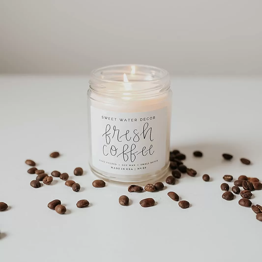 imageSweet Water Decor Spa Day Soy Candle  Sea Salt Jasmine Wood and Cream Scented Candles for Home  9oz Clear Jar  Gold Lid 40 Hour Burn Time Made in the USAFresh Coffee