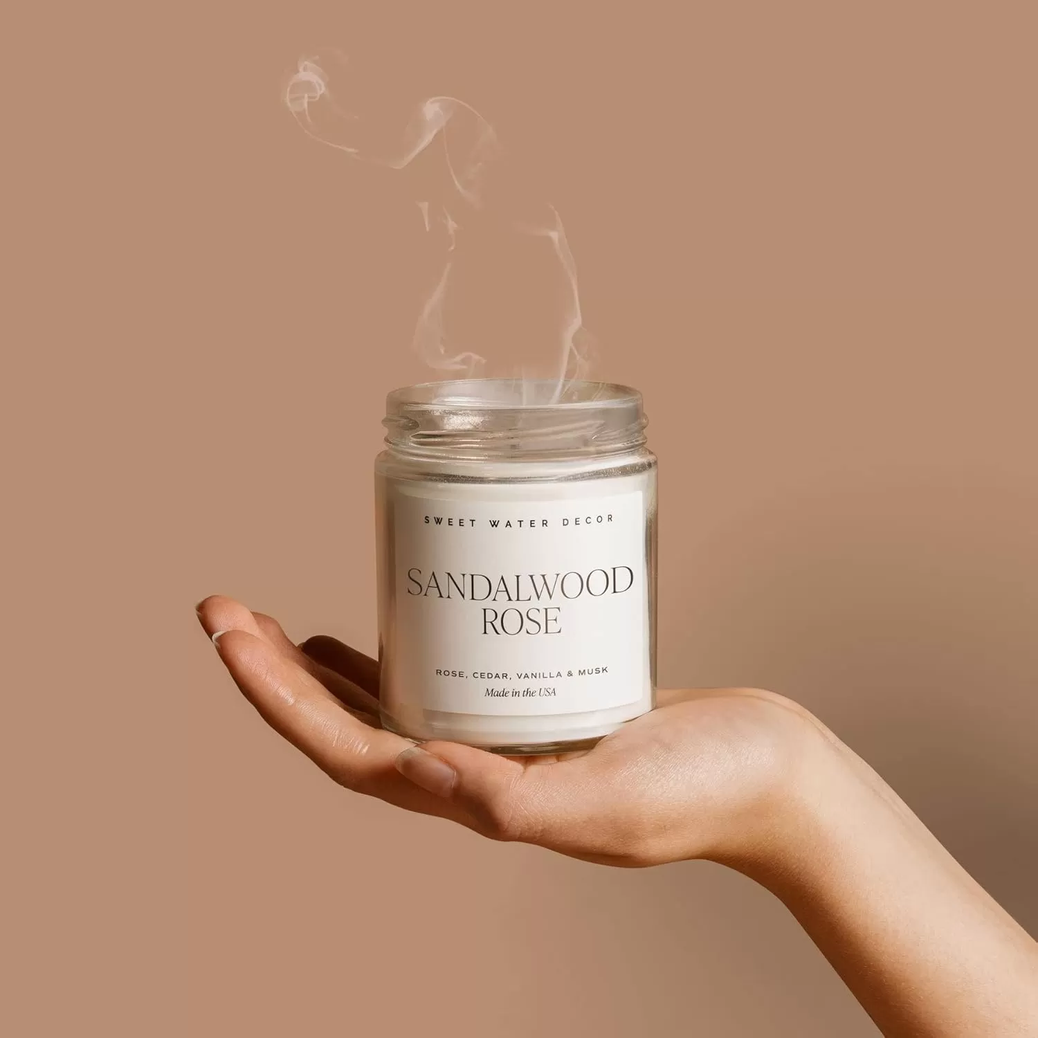 imageSweet Water Decor Spa Day Soy Candle  Sea Salt Jasmine Wood and Cream Scented Candles for Home  9oz Clear Jar  Gold Lid 40 Hour Burn Time Made in the USASandalwood Rose