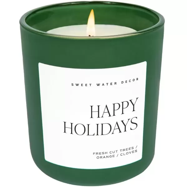 imageSweet Water Decor By The Fireside Candle  Vanilla Caramel Amber Tonka Smoky Woods Musk Winter Scented Soy Candles for Home  15oz Tan Jar 70 Hour Burn Time Made in the USAGreen