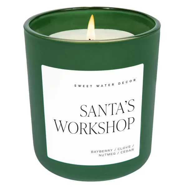 imageSweet Water Decor By The Fireside Candle  Vanilla Caramel Amber Tonka Smoky Woods Musk Winter Scented Soy Candles for Home  15oz Tan Jar 70 Hour Burn Time Made in the USAGreen