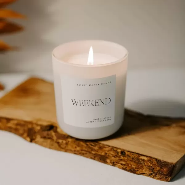 imageSweet Water Decor By The Fireside Candle  Vanilla Caramel Amber Tonka Smoky Woods Musk Winter Scented Soy Candles for Home  15oz Tan Jar 70 Hour Burn Time Made in the USATan
