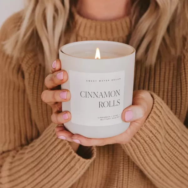 imageSweet Water Decor By The Fireside Candle  Vanilla Caramel Amber Tonka Smoky Woods Musk Winter Scented Soy Candles for Home  15oz Tan Jar 70 Hour Burn Time Made in the USATan