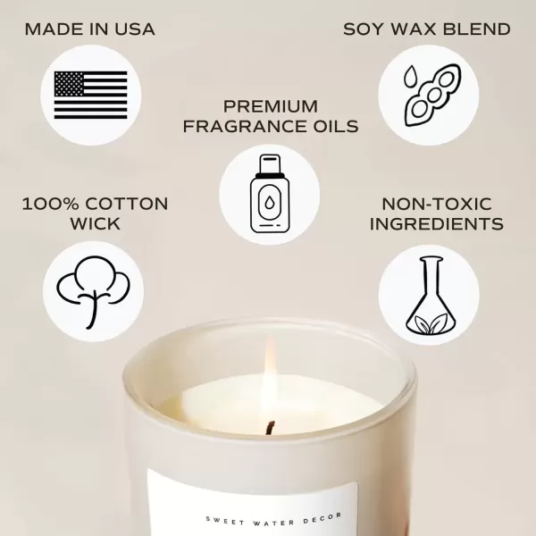 imageSweet Water Decor By The Fireside Candle  Vanilla Caramel Amber Tonka Smoky Woods Musk Winter Scented Soy Candles for Home  15oz Tan Jar 70 Hour Burn Time Made in the USATan