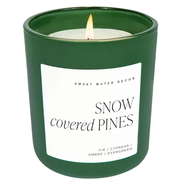 imageSweet Water Decor By The Fireside Candle  Vanilla Caramel Amber Tonka Smoky Woods Musk Winter Scented Soy Candles for Home  15oz Tan Jar 70 Hour Burn Time Made in the USAGreen