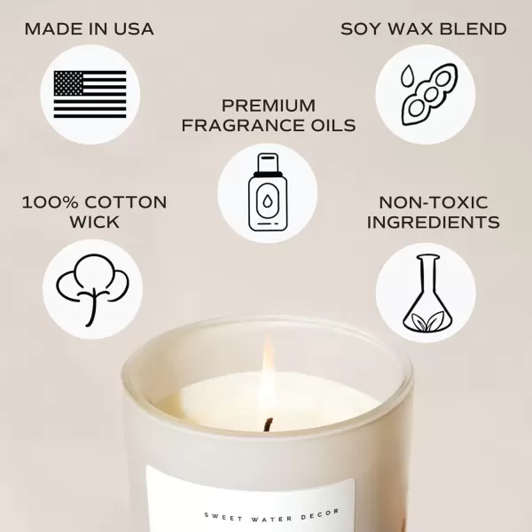 imageSweet Water Decor By The Fireside Candle  Vanilla Caramel Amber Tonka Smoky Woods Musk Winter Scented Soy Candles for Home  15oz Tan Jar 70 Hour Burn Time Made in the USATan