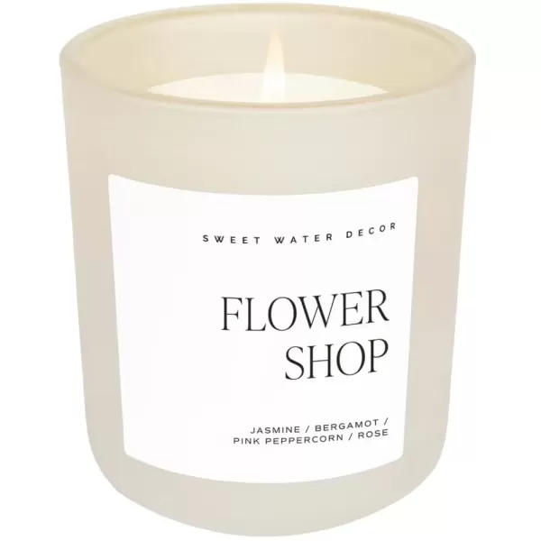 imageSweet Water Decor By The Fireside Candle  Vanilla Caramel Amber Tonka Smoky Woods Musk Winter Scented Soy Candles for Home  15oz Tan Jar 70 Hour Burn Time Made in the USATan