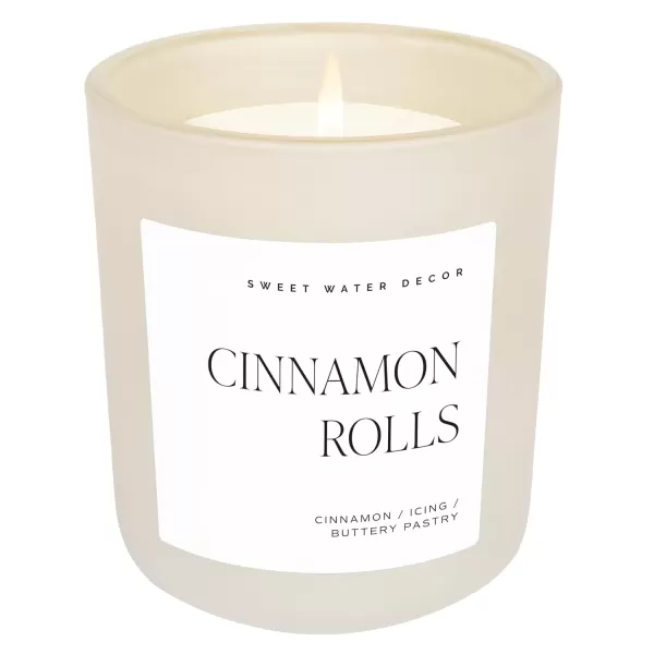 imageSweet Water Decor By The Fireside Candle  Vanilla Caramel Amber Tonka Smoky Woods Musk Winter Scented Soy Candles for Home  15oz Tan Jar 70 Hour Burn Time Made in the USATan
