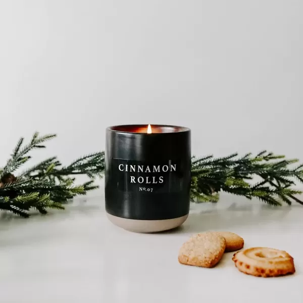 imageSweet Water Decor Christmas Candle  Apple Cider Cinnamon Fresh Cut Christmas Tree and Cookies Scented Soy Candle for Home  12oz Black Stoneware Jar 60 Hour Burn Time Made in the USACinnamon Rolls