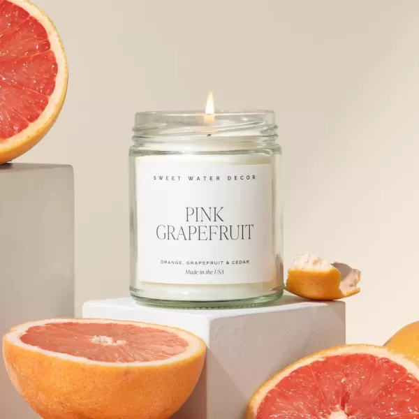 imageSweet Water Decor Christmas Candle  Cinnamon Trees Orange and Clove Scents  Christmas Candles and Decor for Home  9oz Clear Jar Soy Candle Made in the USAPink Grapefruit