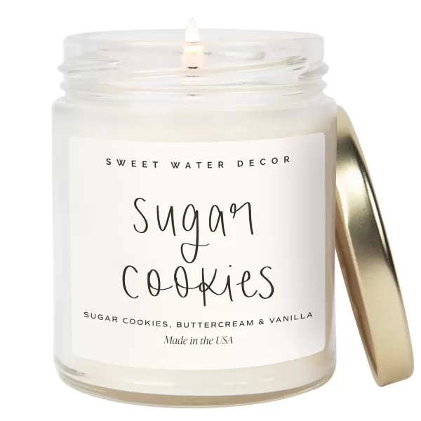 imageSweet Water Decor Christmas Candle  Cinnamon Trees Orange and Clove Scents  Christmas Candles and Decor for Home  9oz Clear Jar Soy Candle Made in the USASugar Cookies
