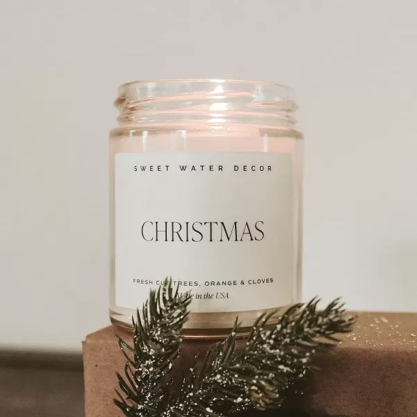 imageSweet Water Decor Christmas Candle  Cinnamon Trees Orange and Clove Scents  Christmas Candles and Decor for Home  9oz Clear Jar Soy Candle Made in the USAChristmas