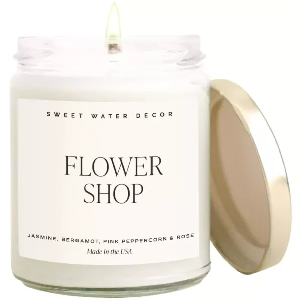 imageSweet Water Decor Christmas Candle  Cinnamon Trees Orange and Clove Scents  Christmas Candles and Decor for Home  9oz Clear Jar Soy Candle Made in the USAFlower Shop