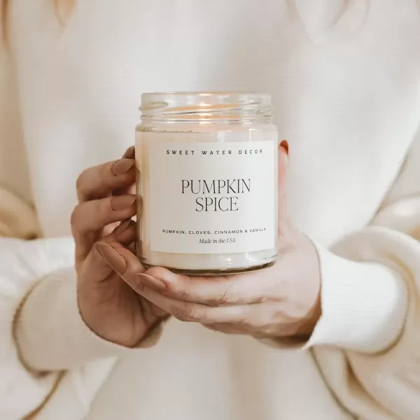 imageSweet Water Decor Christmas Candle  Cinnamon Trees Orange and Clove Scents  Christmas Candles and Decor for Home  9oz Clear Jar Soy Candle Made in the USAPumpkin Spice