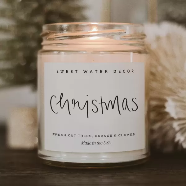 imageSweet Water Decor Christmas Candle  Cinnamon Trees Orange and Clove Scents  Christmas Candles and Decor for Home  9oz Clear Jar Soy Candle Made in the USAChristmas