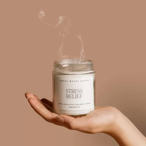 imageSweet Water Decor Christmas Tree Candle  Pine Needles Cedarwood Cypress and Evergreen Soy Holiday Scented Candles for Home  9oz Clear Jar Candle 40 Hour Burn Time Made in the USAStress Relief