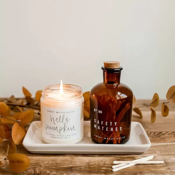 imageSweet Water Decor Christmas Tree Candle  Pine Needles Cedarwood Cypress and Evergreen Soy Holiday Scented Candles for Home  9oz Clear Jar Candle 40 Hour Burn Time Made in the USAHello Pumpkin