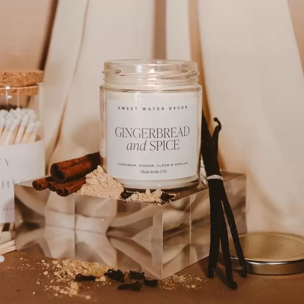 imageSweet Water Decor Christmas Tree Candle  Pine Needles Cedarwood Cypress and Evergreen Soy Holiday Scented Candles for Home  9oz Clear Jar Candle 40 Hour Burn Time Made in the USAGingerbread and Spice