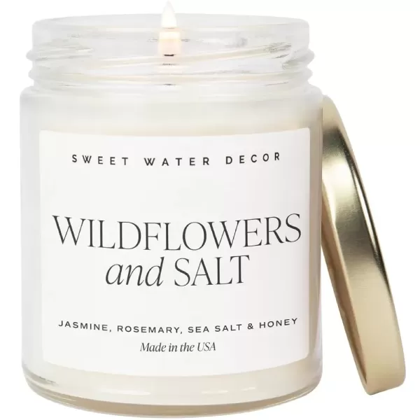 imageSweet Water Decor Christmas Tree Candle  Pine Needles Cedarwood Cypress and Evergreen Soy Holiday Scented Candles for Home  9oz Clear Jar Candle 40 Hour Burn Time Made in the USAWildflowers and Salt